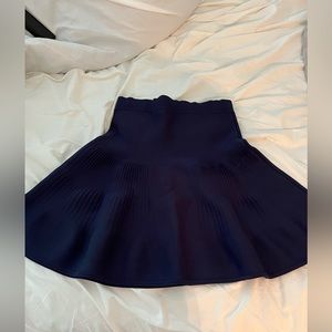 Intermix Navy Lycra fit and flare high waisted skirt. Size small